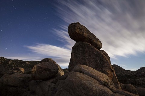 Framed Large boulders backdropped by stars and clouds, California Print