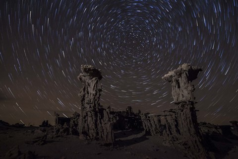 Framed Star trails above sand tufa formations at Mono Lake, California Print