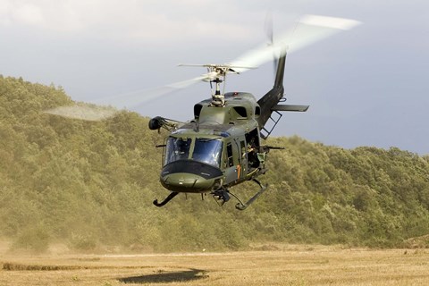 Framed Italian Air Force AB-212 ICO helicopter departs the landing zone, Italy Print