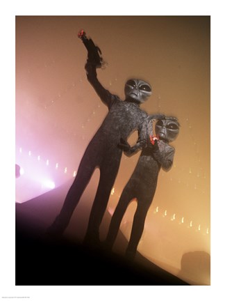 Framed Alien Aiming a Gun Print