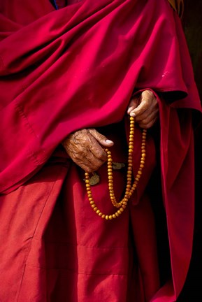 Framed Hands of a monk in red holding prayer beads, Leh, Ladakh, India Print