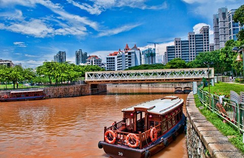 Framed Singapore skyline and tug boats on river. Print