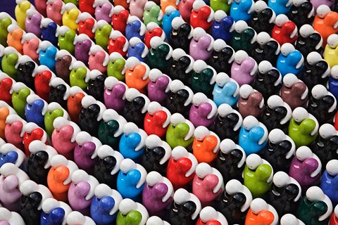 Framed Pattern of glass figures hugging. Outdoor market, Bangkok, Thailand Print