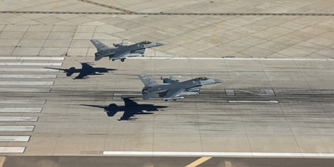 Framed Two F-16&#39;s Land in Formation at Luke Air Force Base, Arizona Print