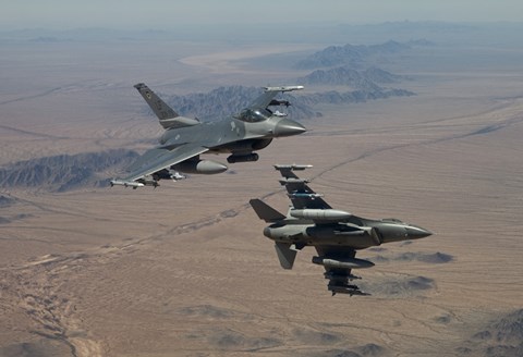Framed Two F-16&#39;s on a training mission over the Arizona desert Print