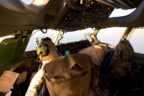 Framed US Army Pilots in-Flight in the Cockpit of a C-17 Globemaster III during a Mission to Qatar Print