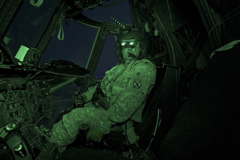 Framed Pilot Wears Night vision Goggles in the Cockpit of a CH-47 Chinook Helicopter Print