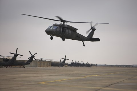 Framed UH-60 Black Hawk Taking off for a Mission Over Northern Iraq Print