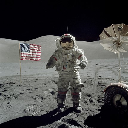 Framed Apollo 17 Astronaut Stands near the American flag on the lunar surface Print