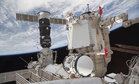 Framed Mini Research Module 1 attached to the International Space Station Print