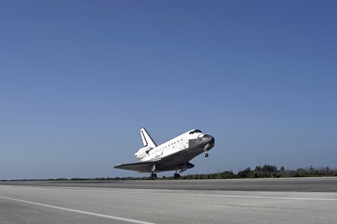 Framed Space shuttle Atlantis approaching Runway 33 at the Kennedy Space Center in Florida Print