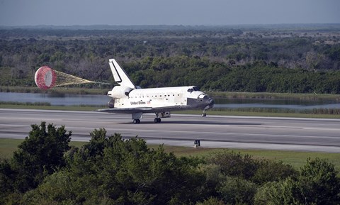 Framed With Drag Chute Unfurled, Space Shuttle Discovery Lands on Runway 33 at Kennedy Space Center in Florida Print