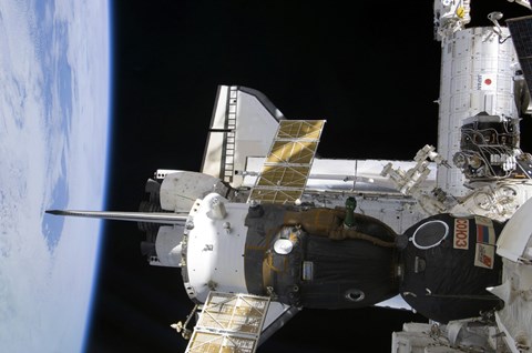 Framed Docked Soyuz Spacecraft over the Docked Space Shuttle Atlantis Print