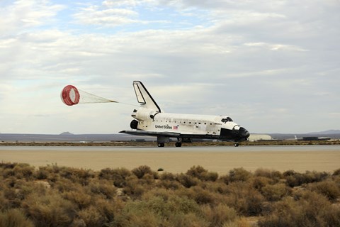 Framed Space Shuttle Discovery Deploys its Drag Chute as the Vehicle comes to a Stop Print
