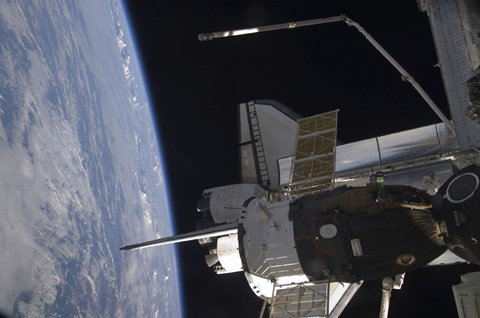 Framed Space Shuttle Discovery Backdropped by Earth&#39;s Horizon Print