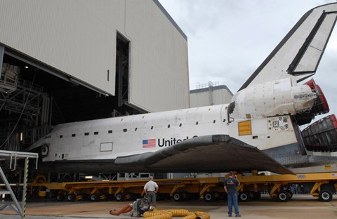 Framed Space Shuttle Atlantis Rolls out of Orbiter Processing Facility 1 at Kennedy Space Center Print