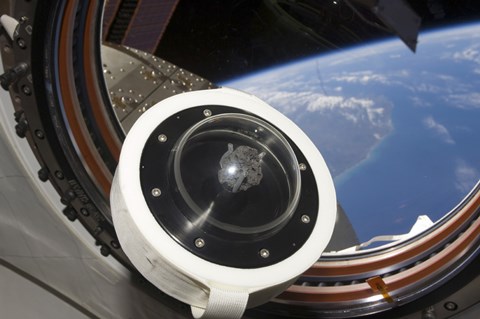 Framed moon rock floats aboard the International Space Station Print