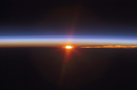 Framed Layers of Earth&#39;s atmosphere, brightly colored as the sun sets over South America Print