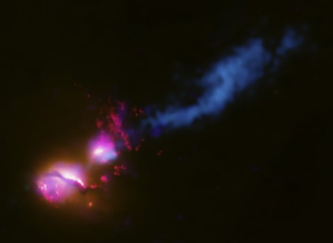 Framed Powerful Jet from a Supermassive Black Hole is Blasting a nearby Galaxy Print