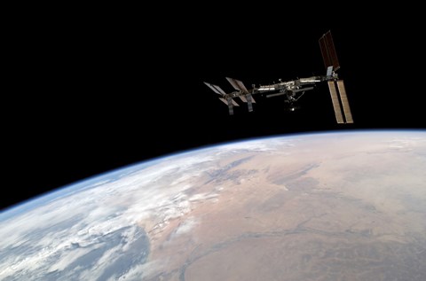 Framed International Space Station Over Earth Print
