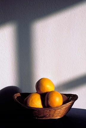 Framed Oia, Santorini, Greece, Oranges in a Basket Print