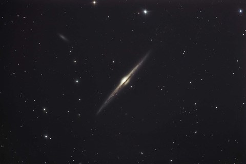Framed NGC 4565, an edge-on unbarred spiral galaxy in the Constellation Coma Berenices Print