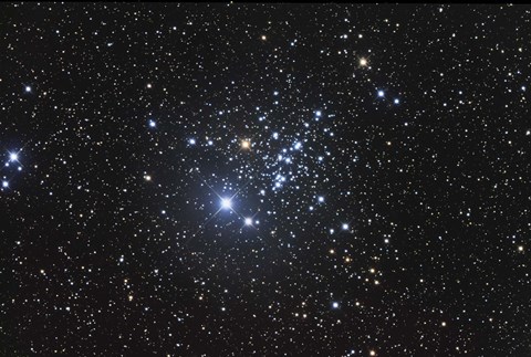 Framed NGC 457 is an open star cluster in the Constellation Cassiopeia Print