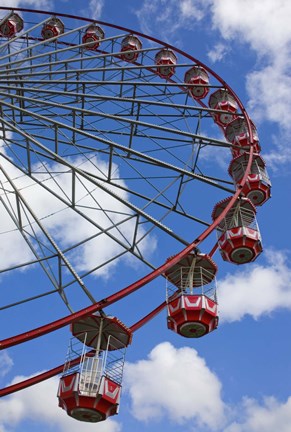 Framed Bright Colored Carnival Ride against Blue Sky Print