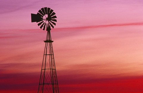 Framed Wind Tower Against Fiery Sunset Print