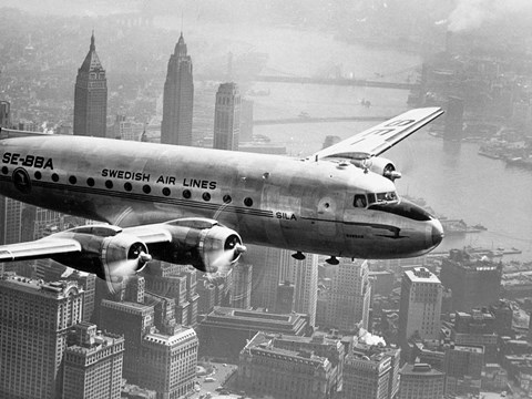 Framed Aircraft Flying over City, 1946 Print