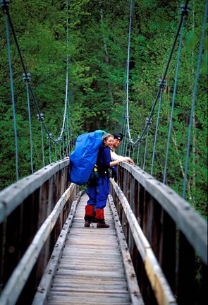 Framed Hikers on a Footbridge Across Pemigewasset River, New Hampshire Print