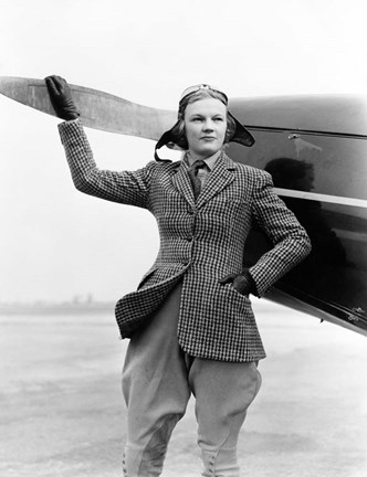 Framed 1930s Woman Aviator Pilot Standing Next To Airplane Print