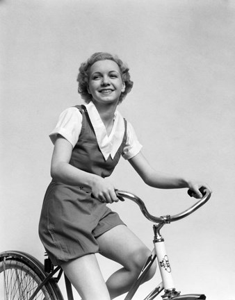 Framed 1930s Smiling Blonde Woman Riding Bicycle Print