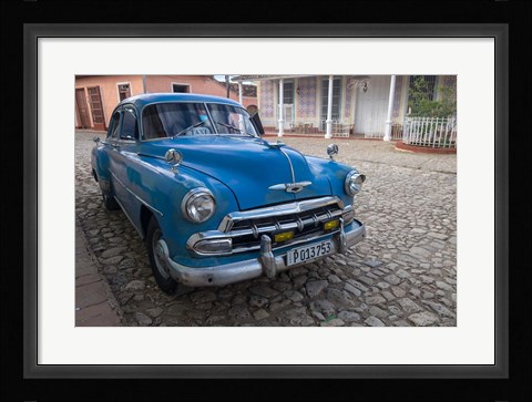 Framed Cuba, Trinidad Blue Taxi Parked On Cobblestones Print