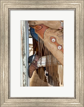 Framed Cowgirl Standing In Doorway Of Old Log Cabin Print