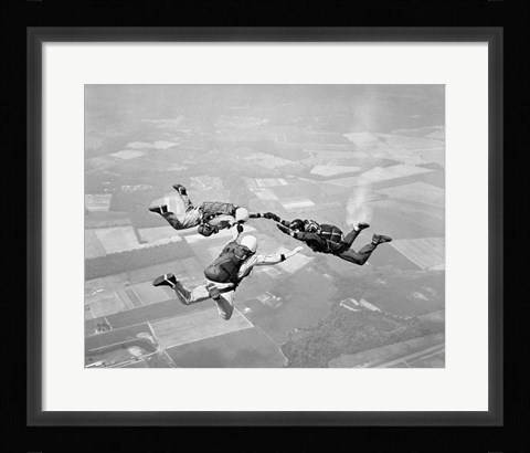 Framed Three Men Holding Hands Sky Diving Print
