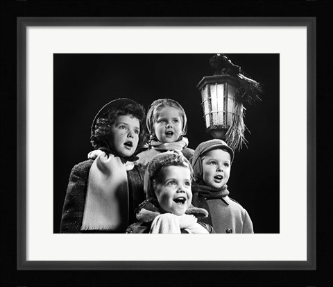 Framed Children Singing Christmas Carols Outdoor By Lantern Light Print
