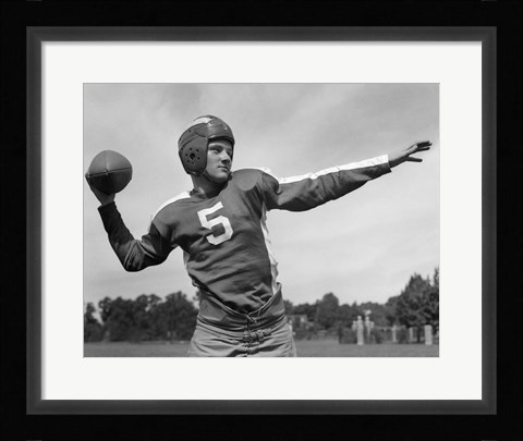 Framed Quarterback About To Toss Football Pass Print