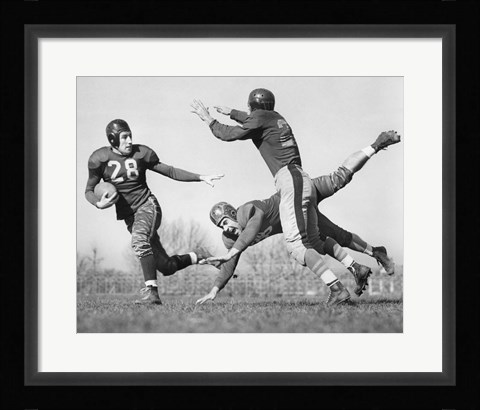 Framed Three Men Playing Football Print