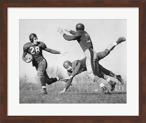 Framed Three Men Playing Football Print