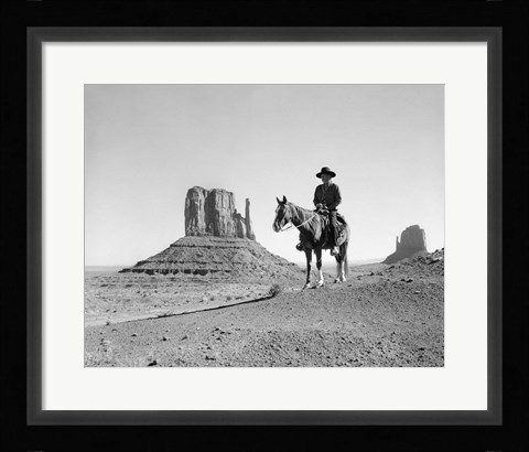 Framed Navajo Indian In Cowboy Hat On Horseback With Monument Valley Rock Formations In Background Print