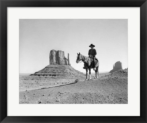 Framed Navajo Indian In Cowboy Hat On Horseback With Monument Valley Rock Formations In Background Print