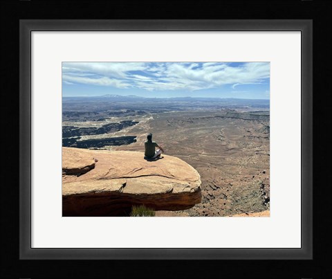 Framed Adult Male Sitting on the Edge Of a Stunning Viewpoint Print