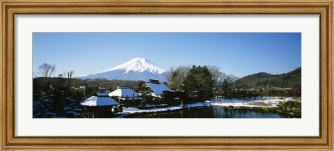 Framed Houses in front of a mountain, Mt Fuji, Honshu, Japan Print