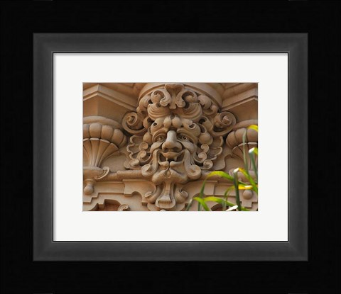 Framed Face In Stone On Buildings Wall Print