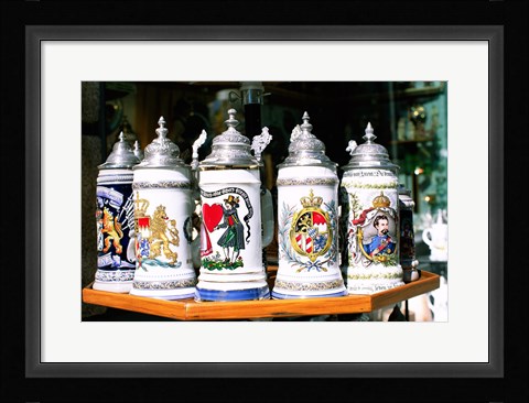 Framed Group of beer steins on a table, Munich, Germany Print