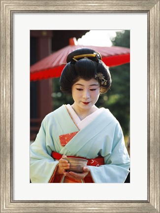 Framed Young woman dressed as a Geisha, Japan Print