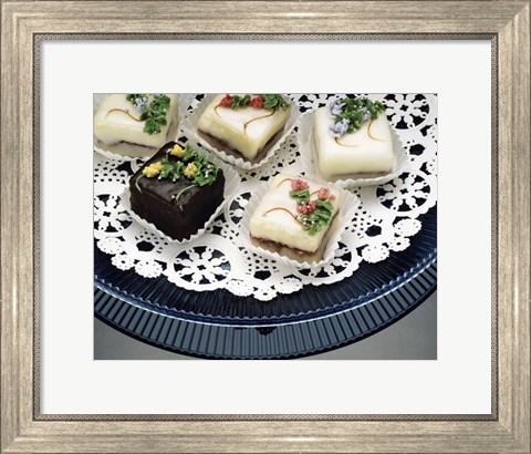 Framed Close-up of assorted cakes on a plate Print