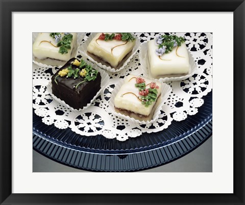 Framed Close-up of assorted cakes on a plate Print