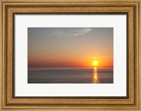 Framed Sunrise over the sea Print
